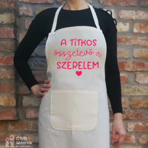 "A titkos összetevő a szerelem" feliratú kötény